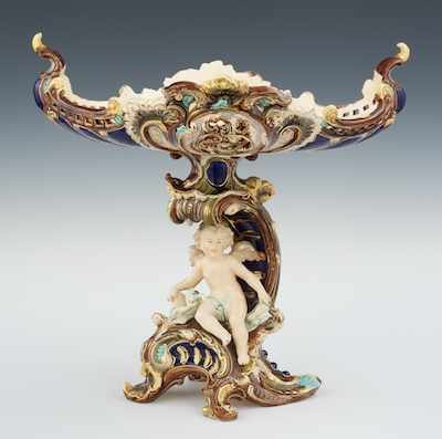 Appraisal: A Large Majolica Centerpiece Pedestal Bowl The curvilinear glazed ceramic