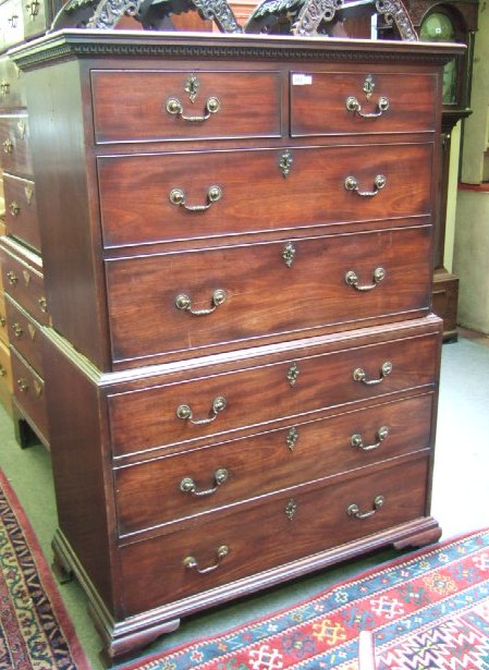 Appraisal: A George III mahogany secretaire chest on chest the dentil