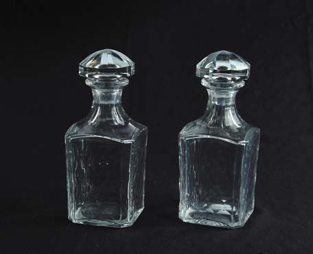 Appraisal: PAIR OF SIGNED BACCARAT DECANTERS Wonderful crystal decanters have honeycomb