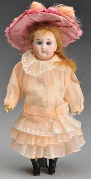 Appraisal: Early German Doll with Closed Mouth Description German bisque socket