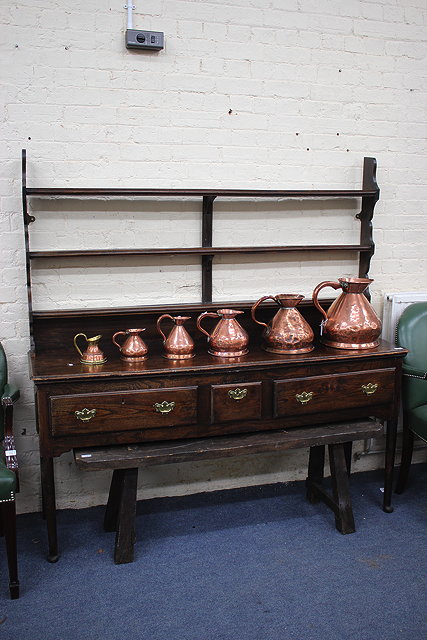 Appraisal: AN TH CENTURY AND LATER DRESSER with three tier plate