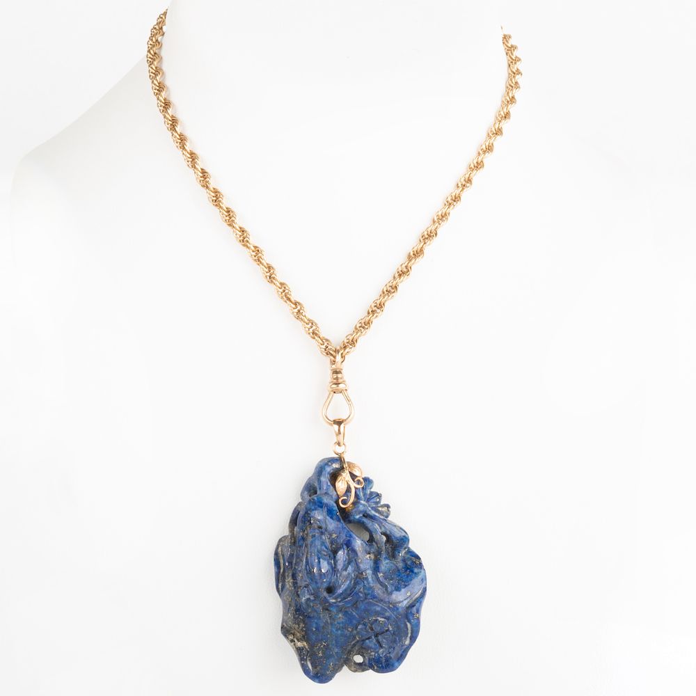 Appraisal: Chinese Style Carved Lapis Lazuli Pendant on a k Gold