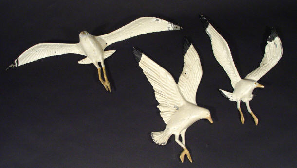 Appraisal: Three cast metal seagull plaques largest cm in length