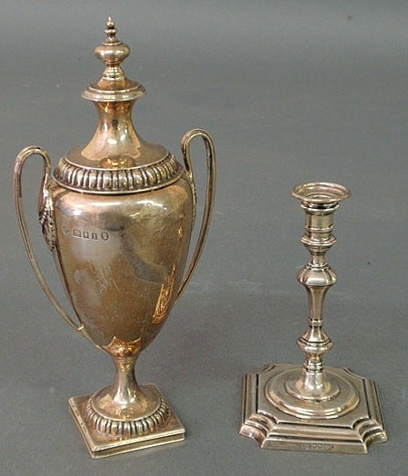 Appraisal: Georgian silver covered urn h and an English silver taper