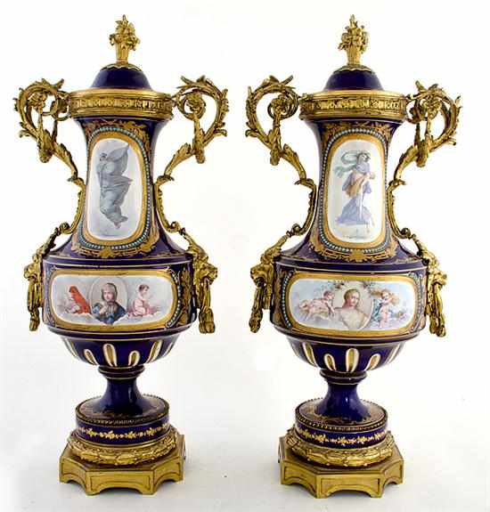 Appraisal: Exceptional pair Sevres style gilt-bronze-mounted porcelain urns late th century