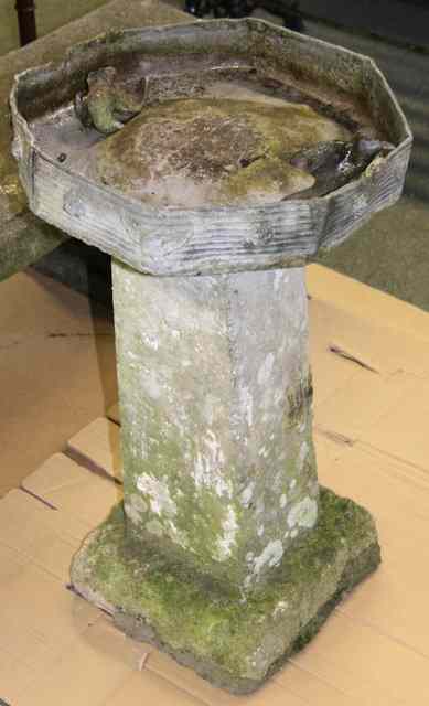 Appraisal: A lead bird bath on a stone column