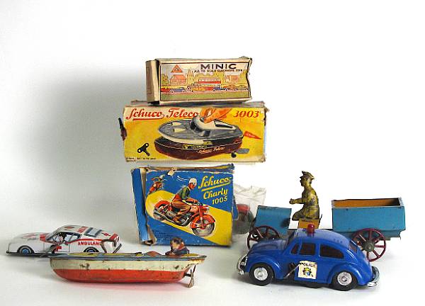 Appraisal: Clockwork European Transportation toys Lot includes a variety of lithographed