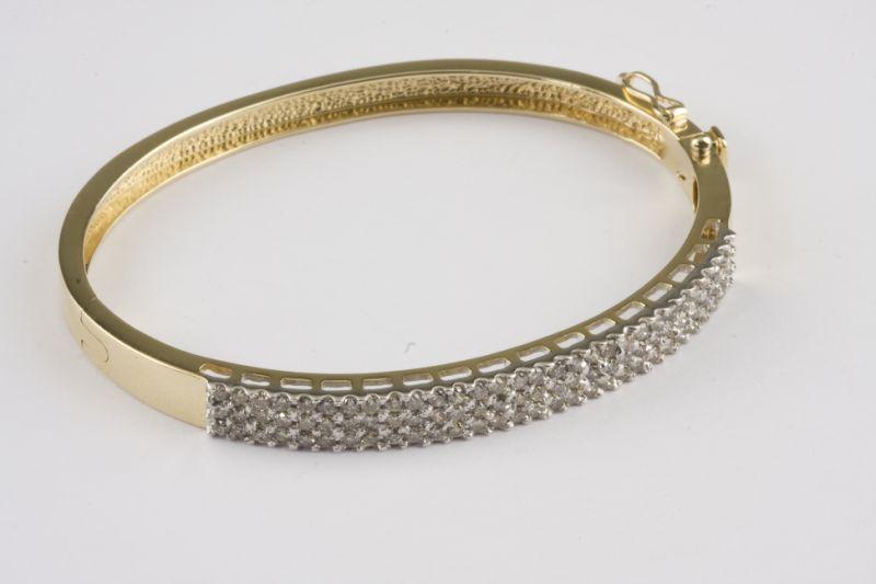 Appraisal: KT Diamond Bangle Bracelet yellow gold with pave set round