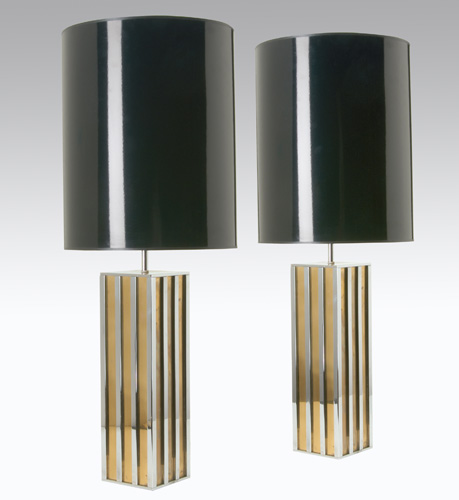 Appraisal: JANSEN Pair of double-socket polished chrome and brass table lamps