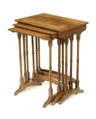 Appraisal: A nest of three mahogany occasional tables in Regency style