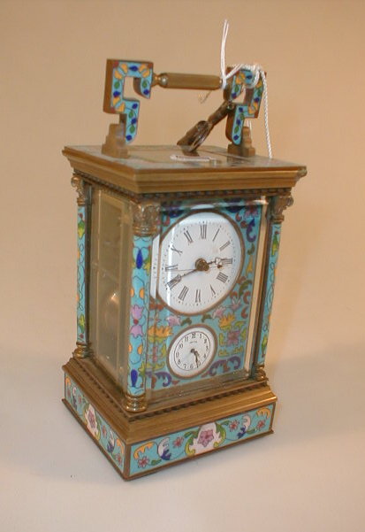 Appraisal: A modern reproduction cloisonn enamelled carriage clock