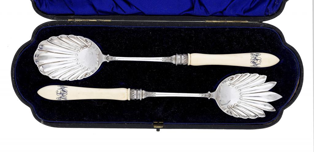 Appraisal: A PAIR OF VICTORIAN IVORY-HAFTED SALAD SERVERS by W Hutton