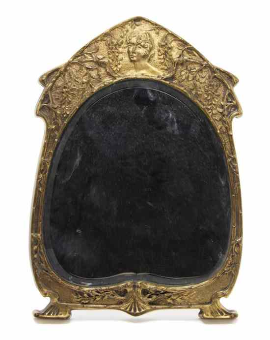 Appraisal: An American Bronze Art Nouveau Table Mirror having a shaped