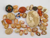 Appraisal: A mixed lot comprising unmounted cameos including three coral one