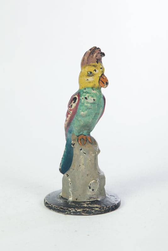 Appraisal: CAST IRON DOORSTOP American st quarter- th century Polychrome parrot