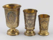 Appraisal: Three Russian silver vodka cups of varying sizes largest cm