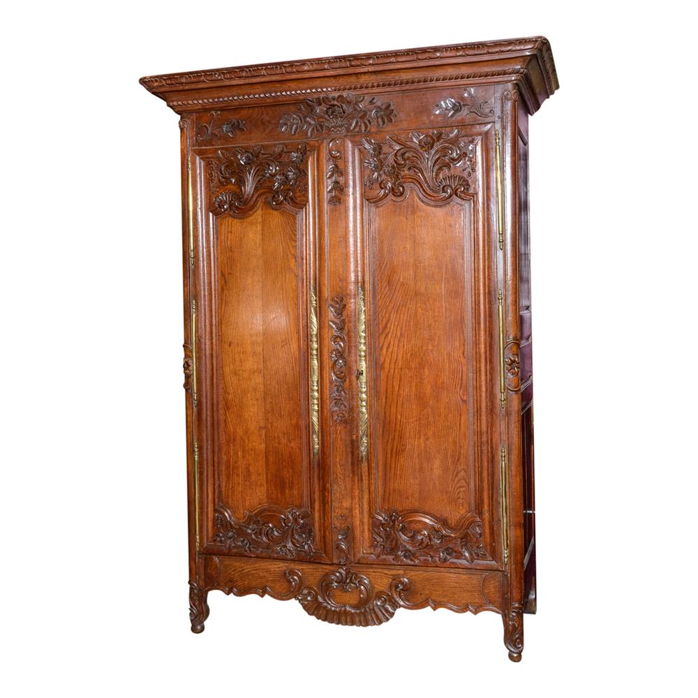 Appraisal: FRENCH PROVINCIAL CARVED OAK ARMOIRE having a carved and outset