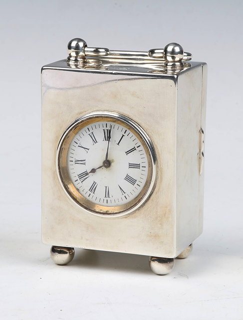 Appraisal: A LATE VICTORIAN RECTANGULAR SHAPED TIMEPIECE with bun feet and