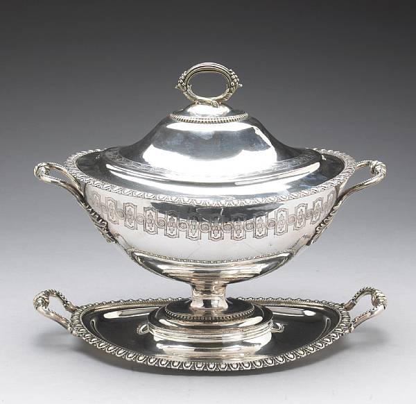 Appraisal: An English Victorian electroplate soup tureen with cover and standMarked