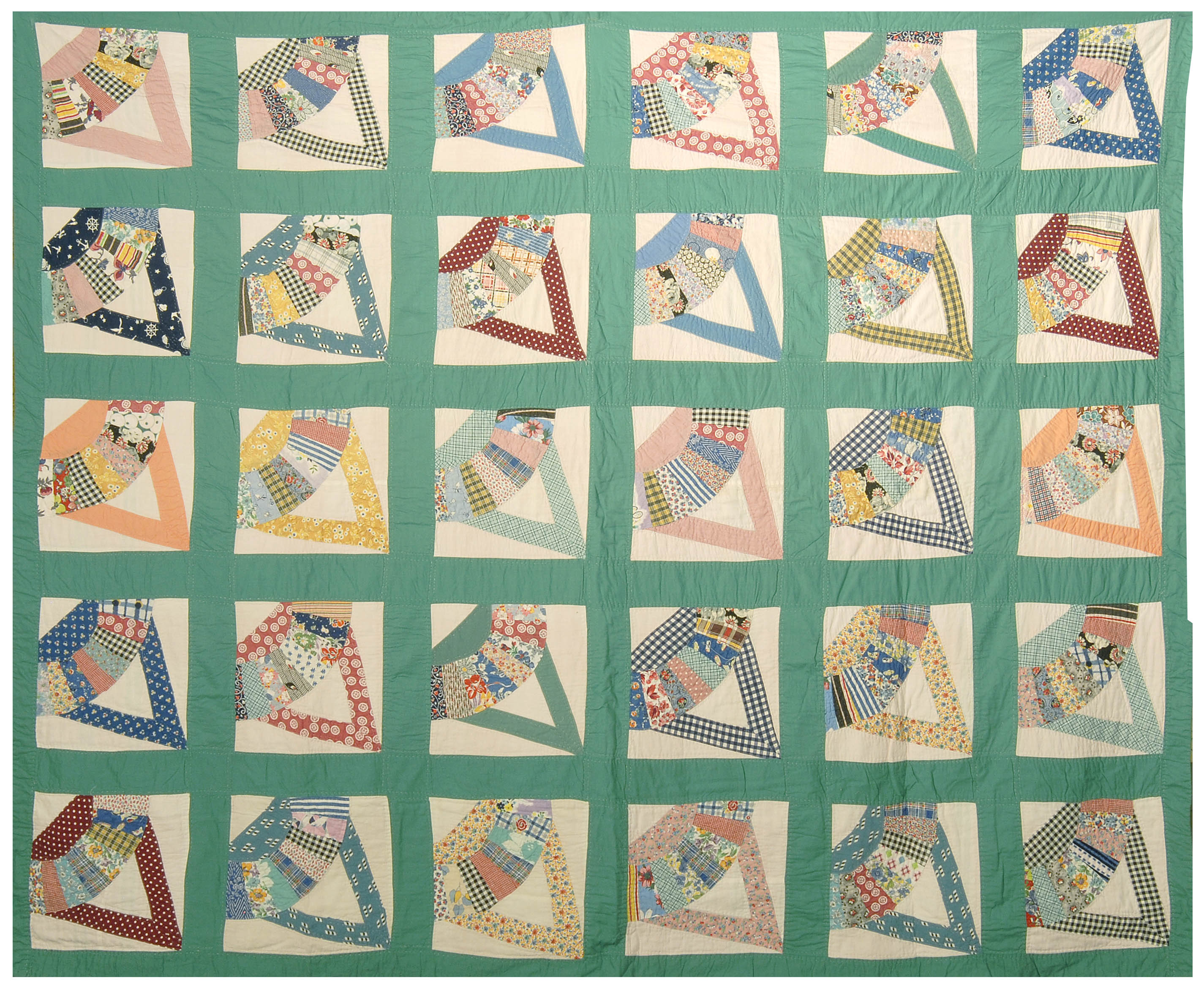 Appraisal: HAND-PIECED COTTON QUILT Circa In a colorful Art Deco Basket