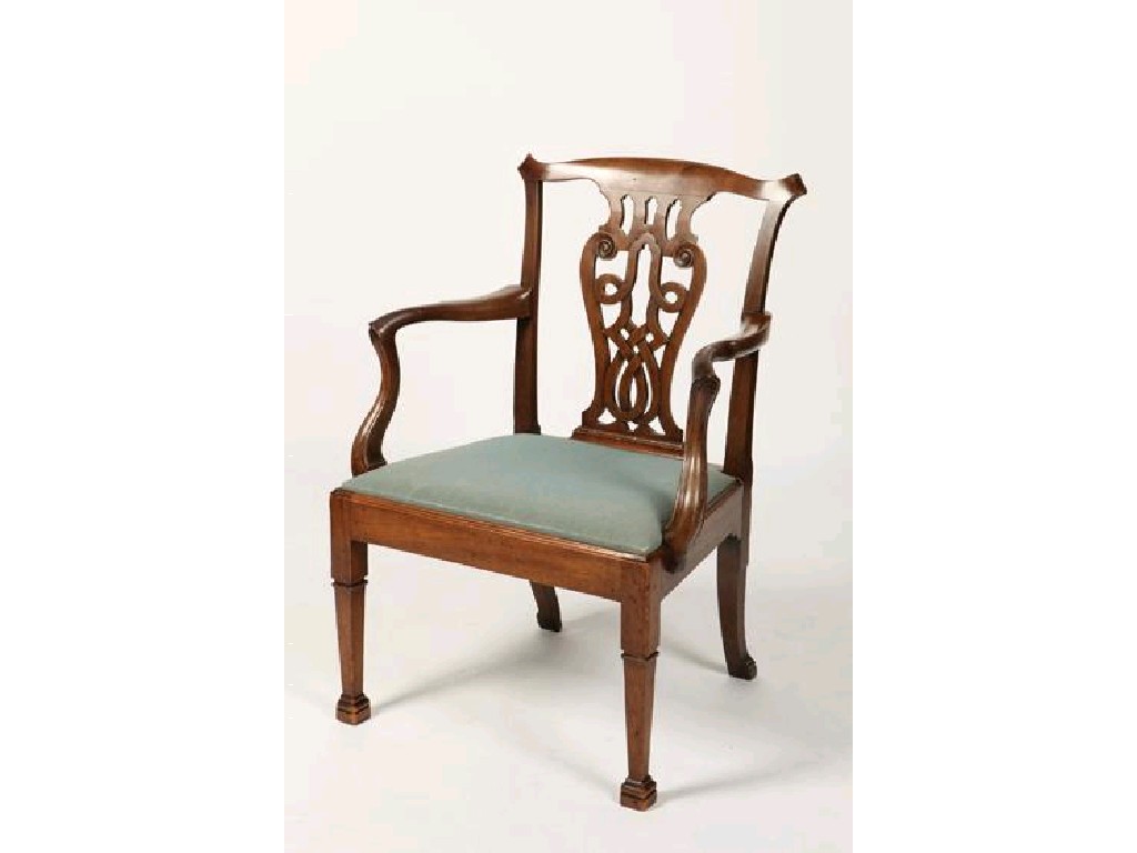 Appraisal: A GEORGE III MAHOGANY ARMCHAIR with a serpentine top rail