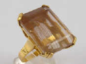 Appraisal: A yellow metal tests carat gold rutilated quartz ring the