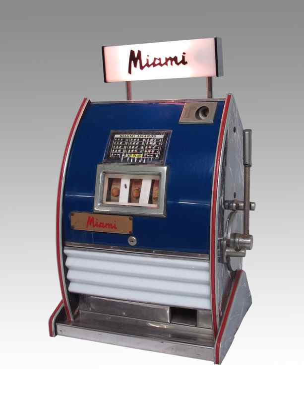 Appraisal: ENGLISH MIAMI ONE PENCE SLOT MACHINE ''Miami'' emblems on front