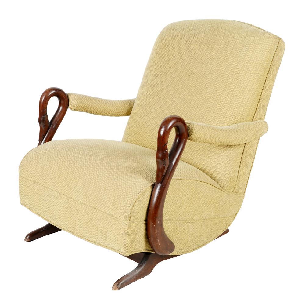 Appraisal: ART DECO-STYLE UPHOLSTERED ROCKING CHAIRwith carved swan-form arm terminals and