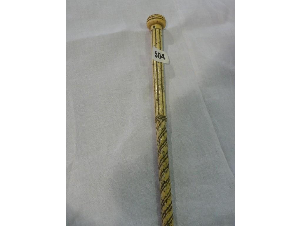 Appraisal: An bone walking cane with reeded top section a spiral