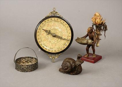 Appraisal: Clock-Form Calendar Modern Together with three other decorative articles in