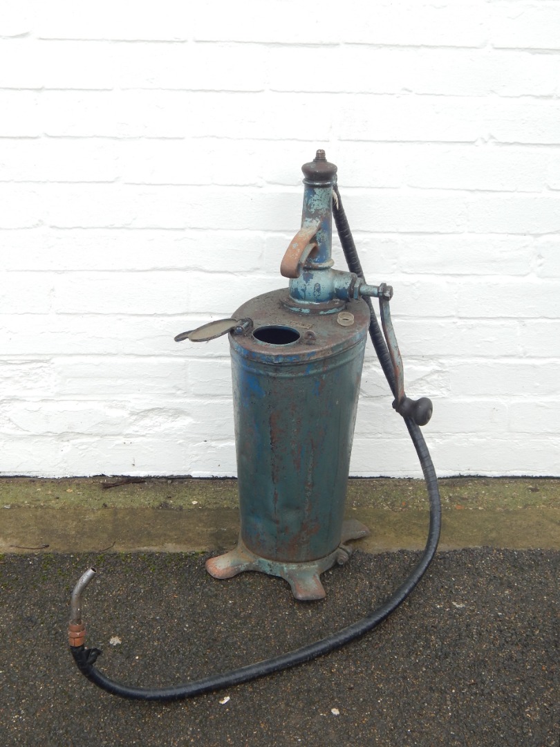 Appraisal: A Regent oil tin oil dispenser with crank handle and