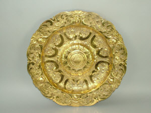 Appraisal: A Victorian copper gilt circular charger in th century style