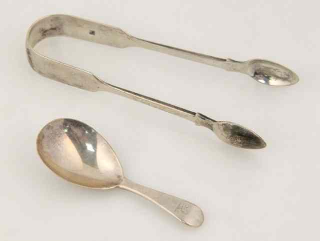 Appraisal: A William IV silver caddy spoon London crested and a