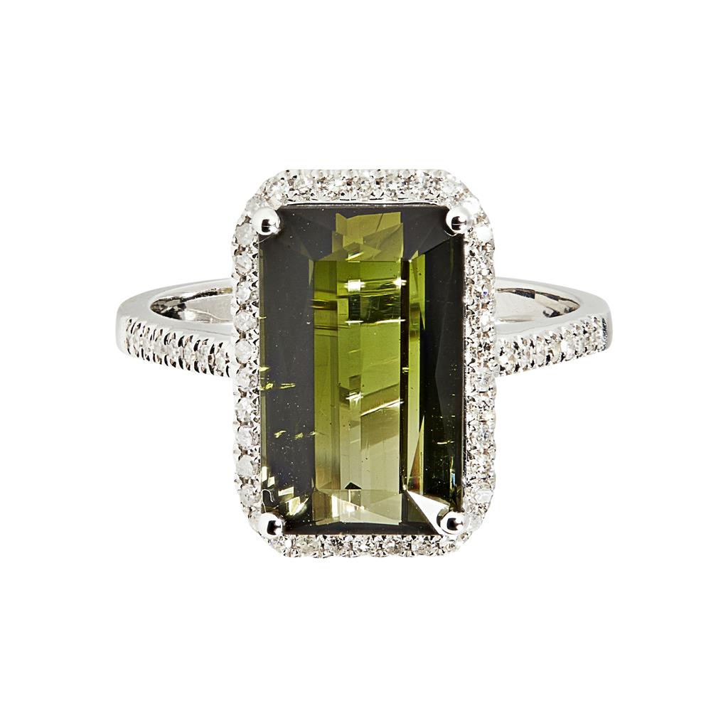 Appraisal: A green tourmaline and diamond set ring claw set with