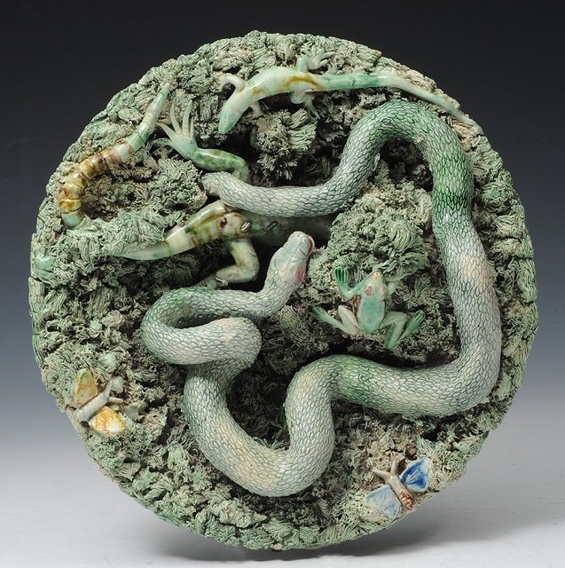 Appraisal: A PORTUGUESE PALISSY STYLE CHARGER the green thick moss ground