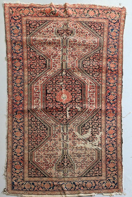 Appraisal: A MALAYER ROSE PINK RUG with an inter-connecting central triple