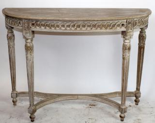 Appraisal: Carved and white washed demi-lune console Fluted legs and floral