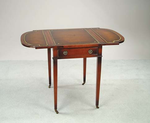 Appraisal: MAHOGANY ONE DRAWER DROP LEAF STAND Leather inset top shaped