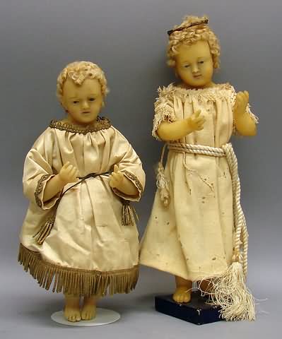 Appraisal: Pr of poured wax dolls-baby and child Baby dressed in