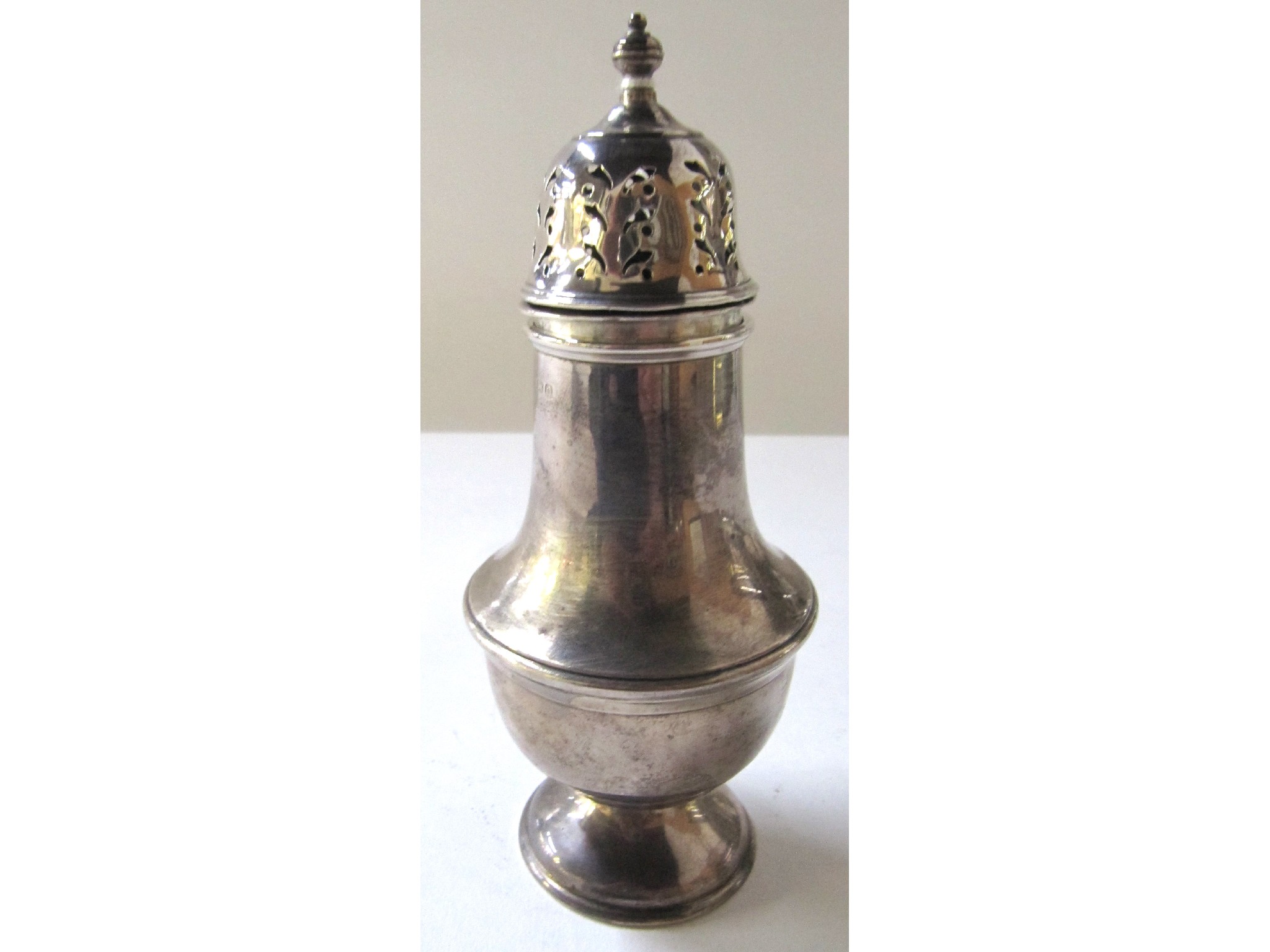 Appraisal: A silver sugar shaker Birmingham