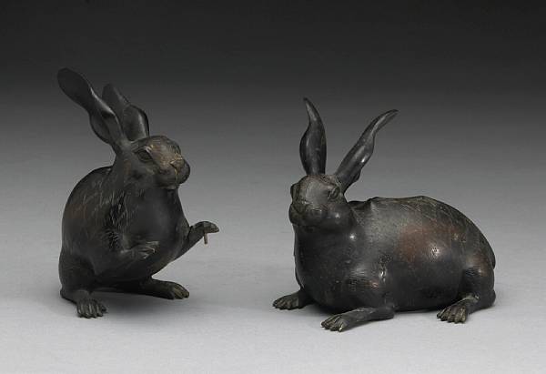 Appraisal: A two-part patinated bronze animal group Meiji Period Cast as