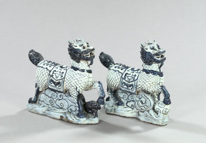 Appraisal: Large Pair of Kuang-Hsu Blue-and-White Porcelain Figures of Galloping Kylin