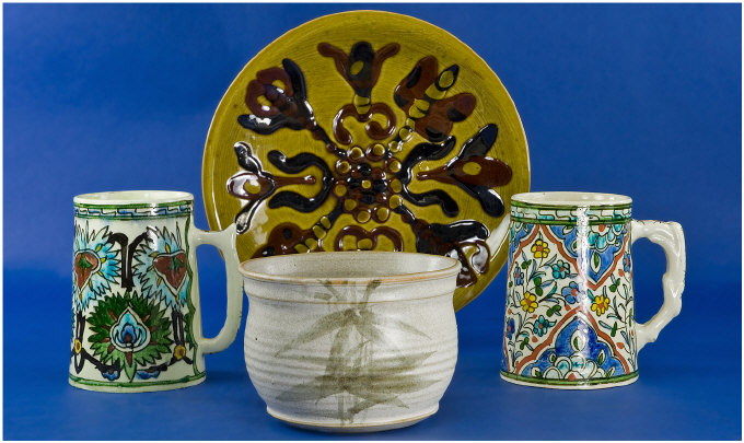 Appraisal: Two Faience Tankards with Moorish Influence Decoration each inches high