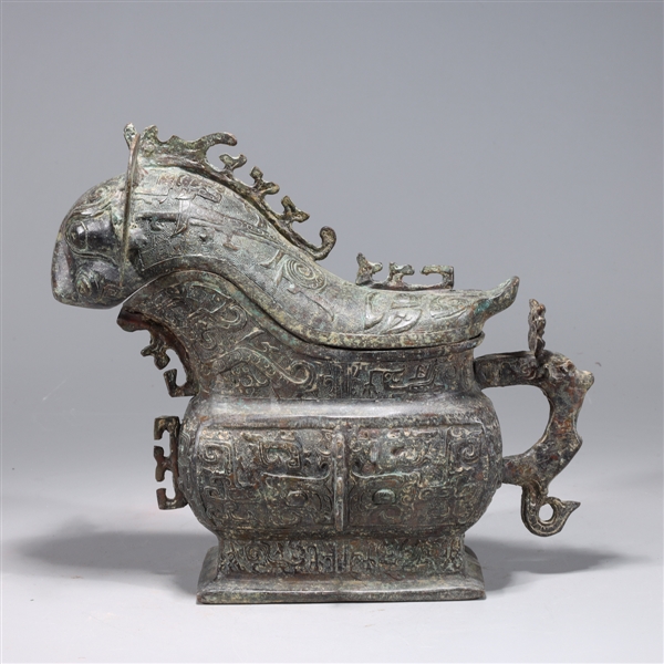 Appraisal: Chinese archaistic bronze covered vessel with intricate allover incised and