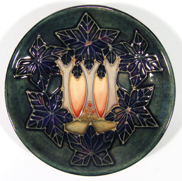 Appraisal: Moorcroft pottery dish hand painted and tubelined with stylised flowers