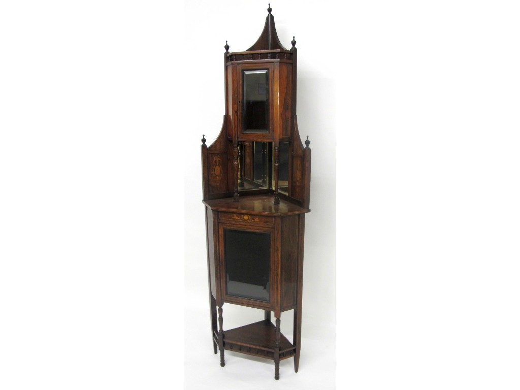 Appraisal: A late Victorian Edwardian rosewood corner cabinet the top with