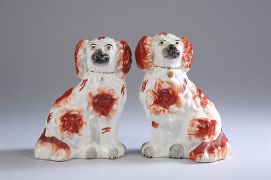 Appraisal: PAIR STAFFORDSHIRE POTTERY SPANIELS late th century - in high