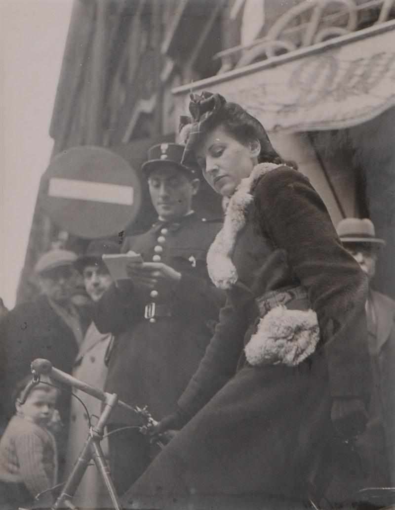 Appraisal: ROBERT DOISNEAU - UN GENDARME ET UNE CYCLISTE Black and