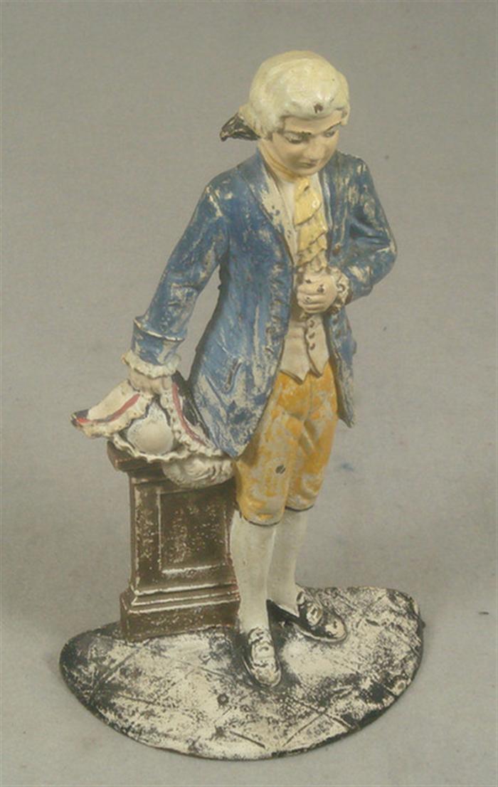 Appraisal: Cast iron doorstop French gentleman posing in formal attire stamped