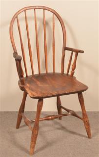 Appraisal: Windsor Mixed Wood Bow-back Armchair Five spindle-back shaped arms with